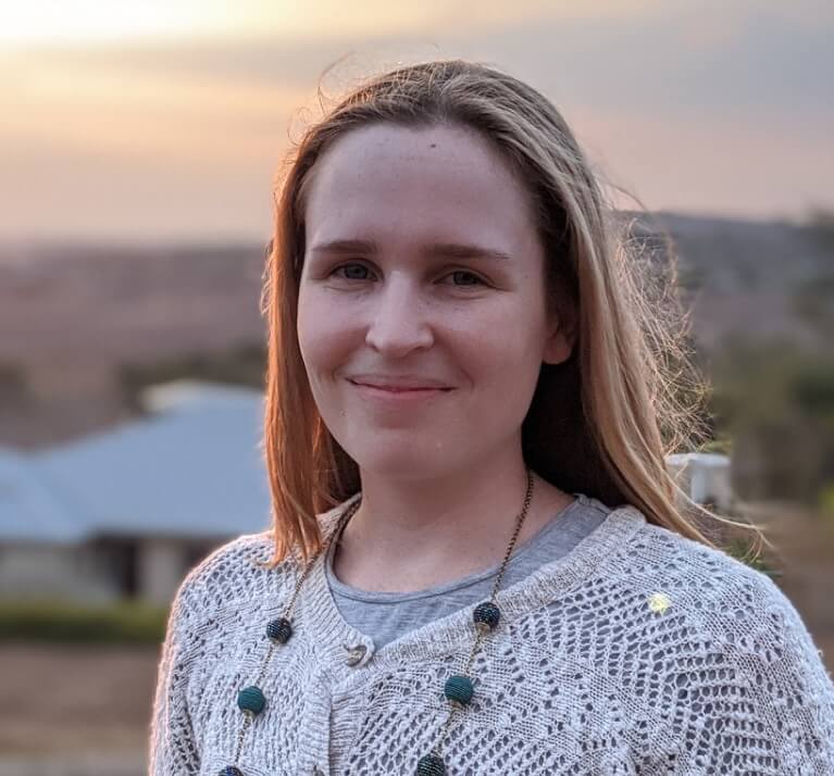 Angela Rodgers smiling outside